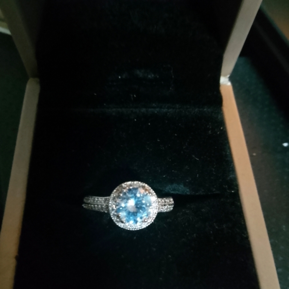 Elegant Silver Halo Ring with Blue Gemstone